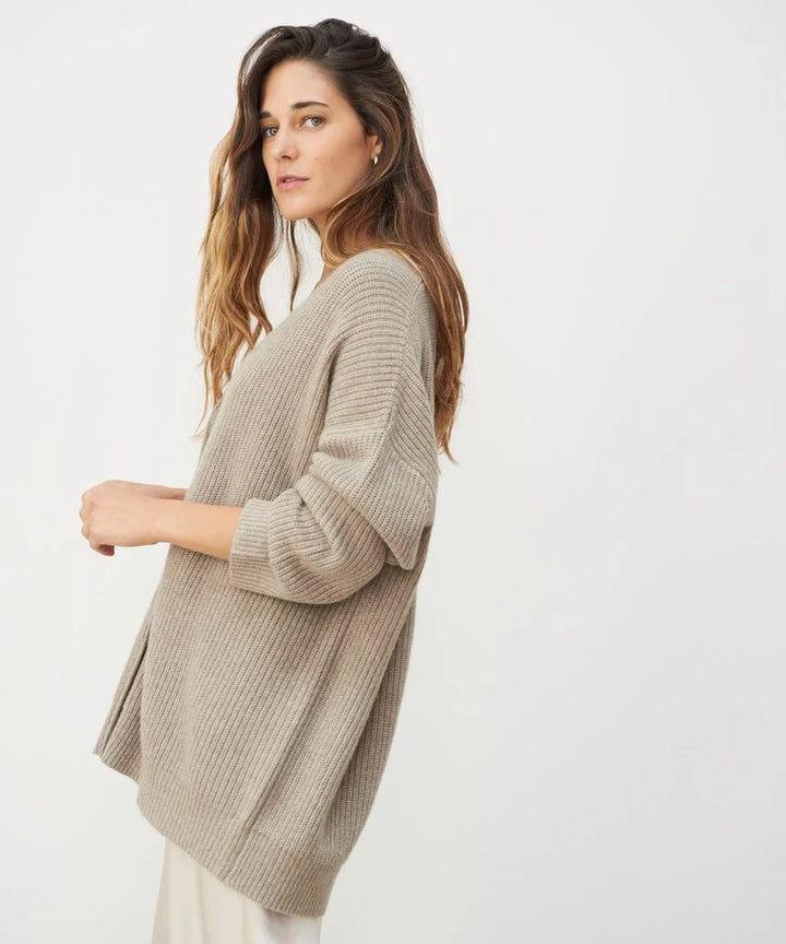 Women's ribbed knit V-neck cardigan with button front and long sleeves
