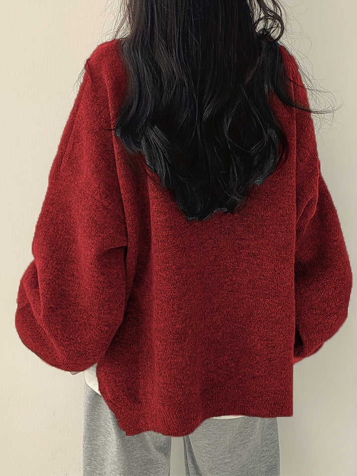 Women's loose crew neck jumper with long sleeves, ribbed trims and split hem