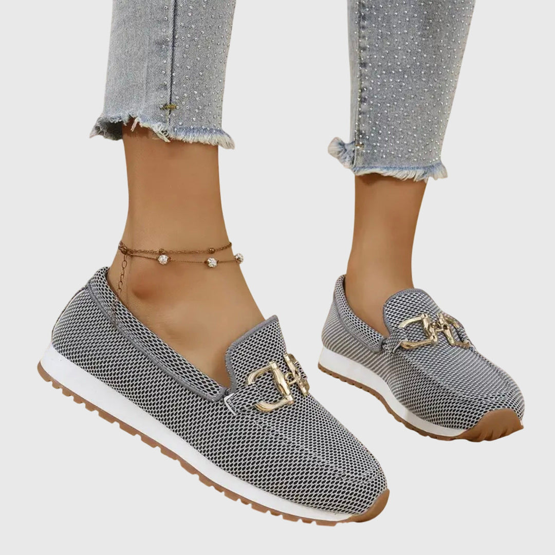 Women's loafer sneakers with metal bar detail and flat textured sole