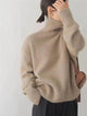 Women's relaxed turtleneck sweater with long sleeves and ribbed trims
