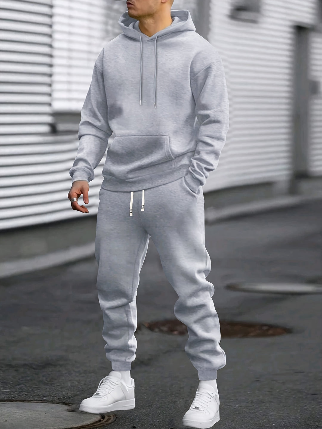 Men's hooded sweatshirt and jogger trouser set with drawstring details and cuffed ankles