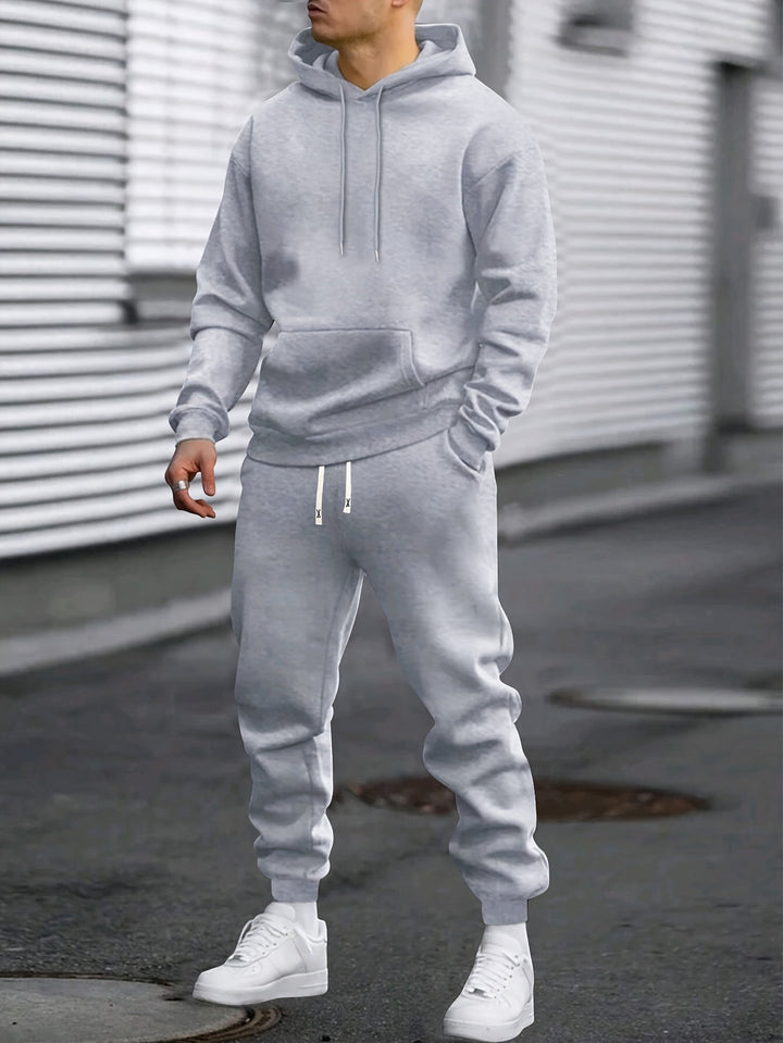 Men's hooded sweatshirt and jogger trouser set with drawstring details and cuffed ankles