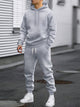 Men's hooded sweatshirt and jogger trouser set with drawstring details and cuffed ankles