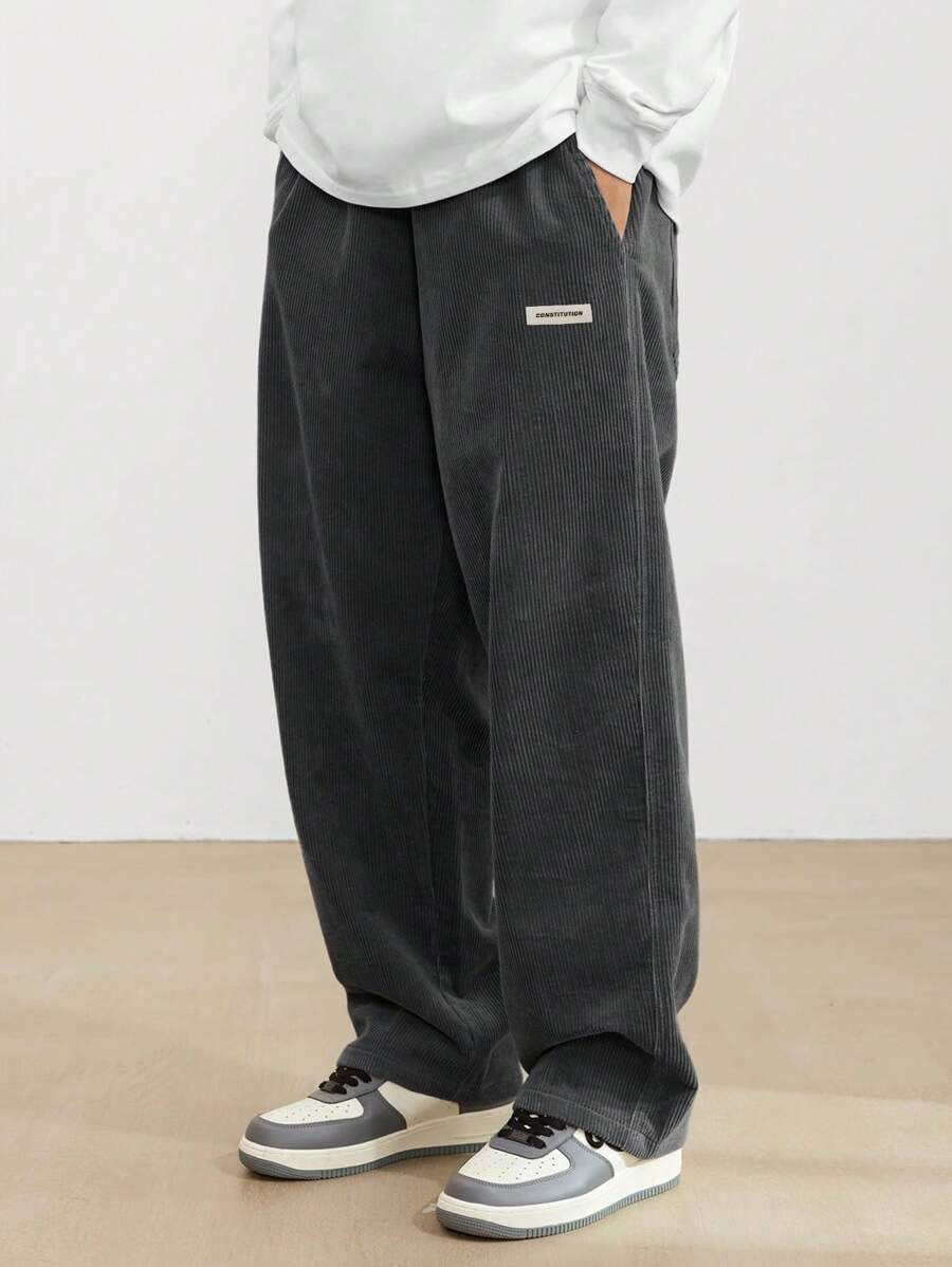 Men's wide-leg ribbed trousers with side pockets and long straight legs