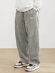 Men's wide-leg ribbed trousers with side pockets and long straight legs