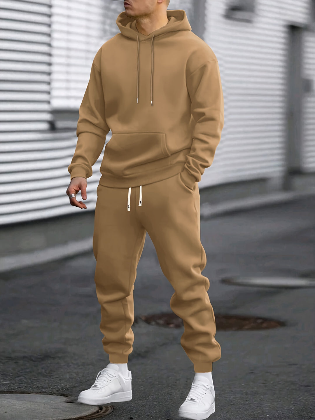 Men's hooded sweatshirt and jogger trouser set with drawstring details and cuffed ankles
