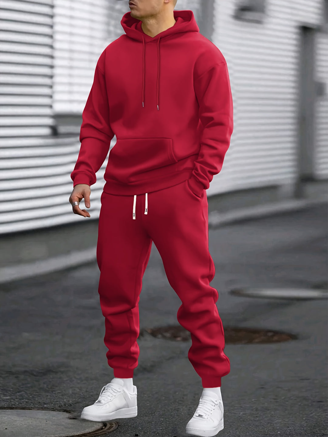 Men's hooded sweatshirt and jogger trouser set with drawstring details and cuffed ankles