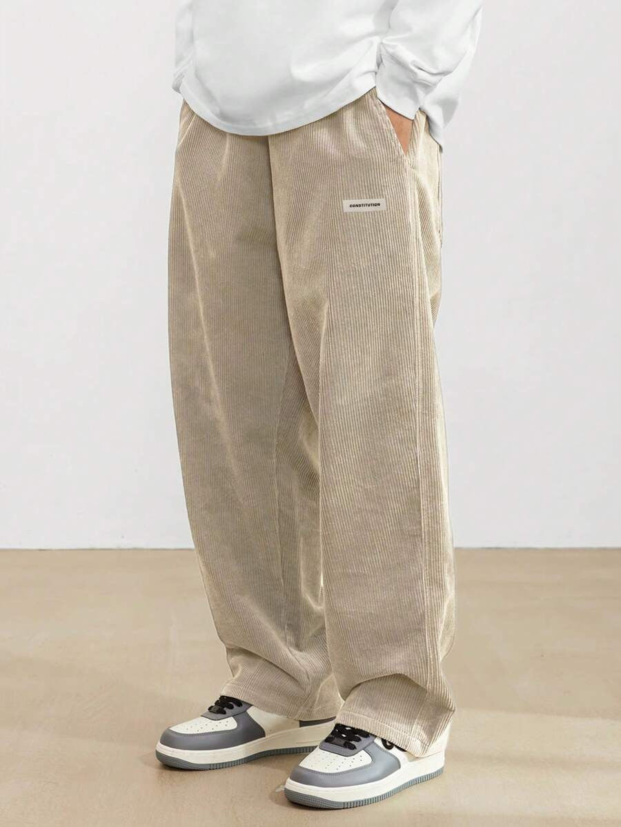 Men's wide-leg ribbed trousers with side pockets and long straight legs