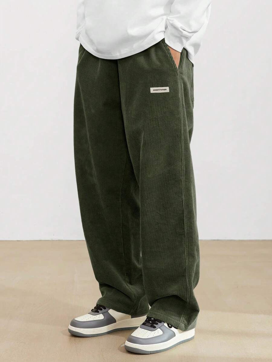 Men's wide-leg ribbed trousers with side pockets and long straight legs