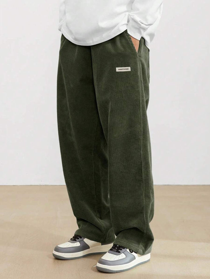 Men's wide-leg ribbed trousers with side pockets and long straight legs