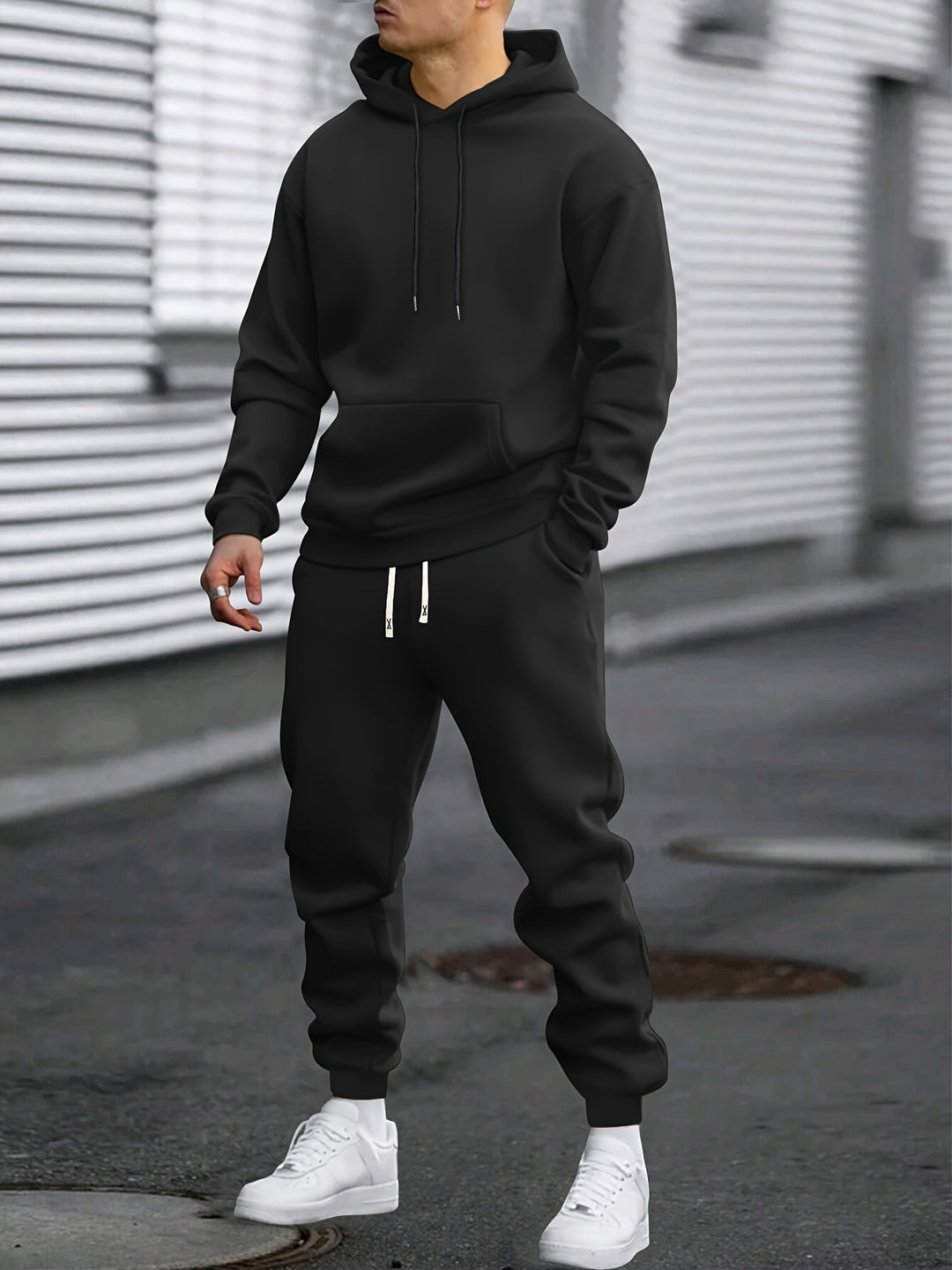 Men's hooded sweatshirt and jogger trouser set with drawstring details and cuffed ankles