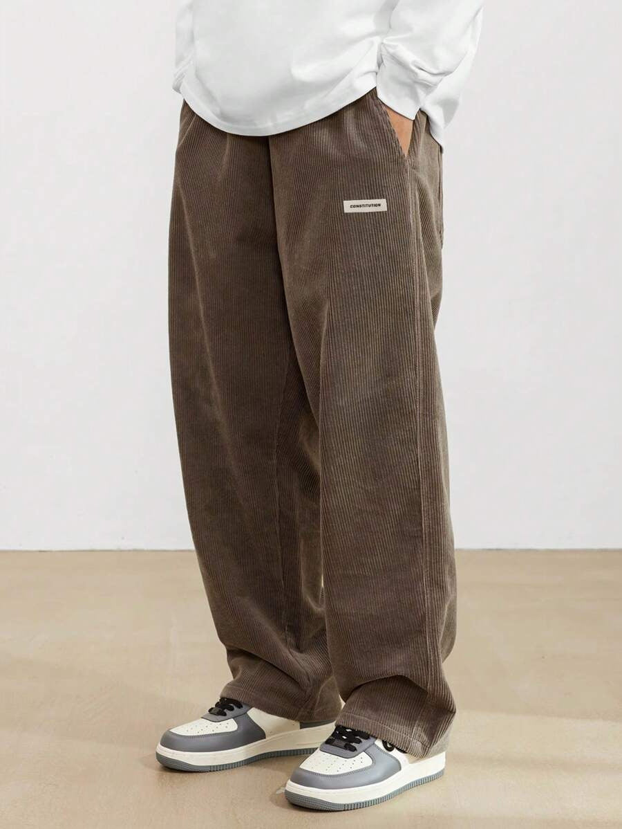 Men's wide-leg ribbed trousers with side pockets and long straight legs