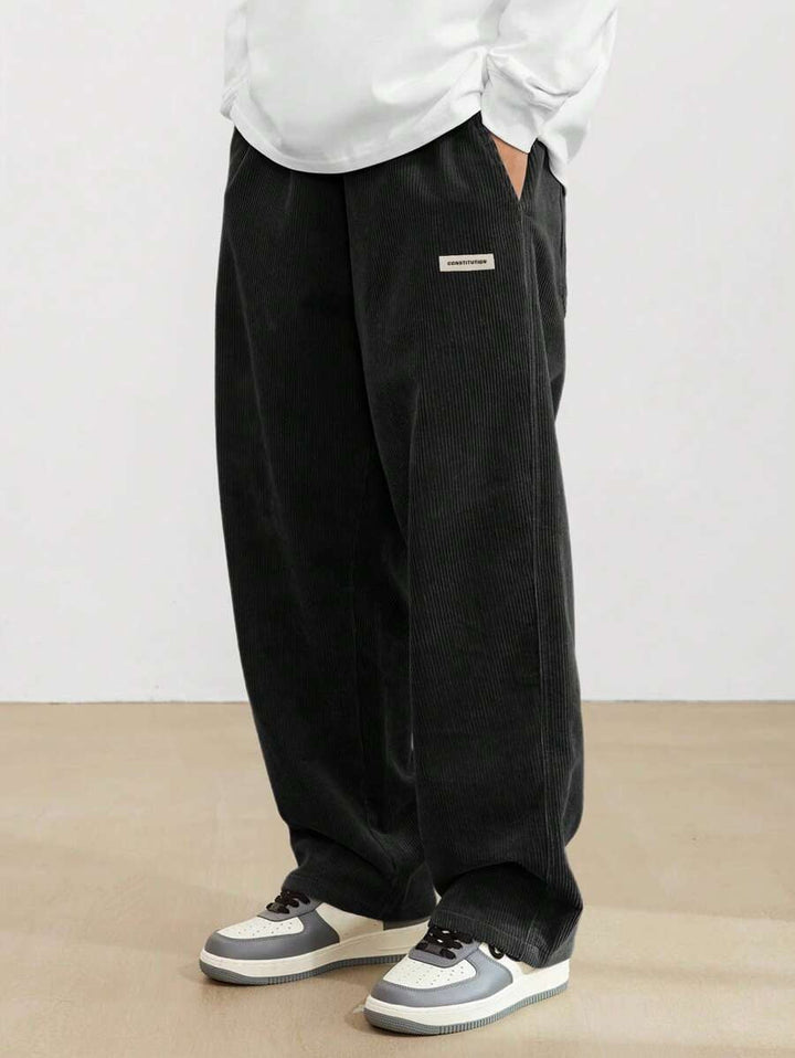 Men's wide-leg ribbed trousers with side pockets and long straight legs