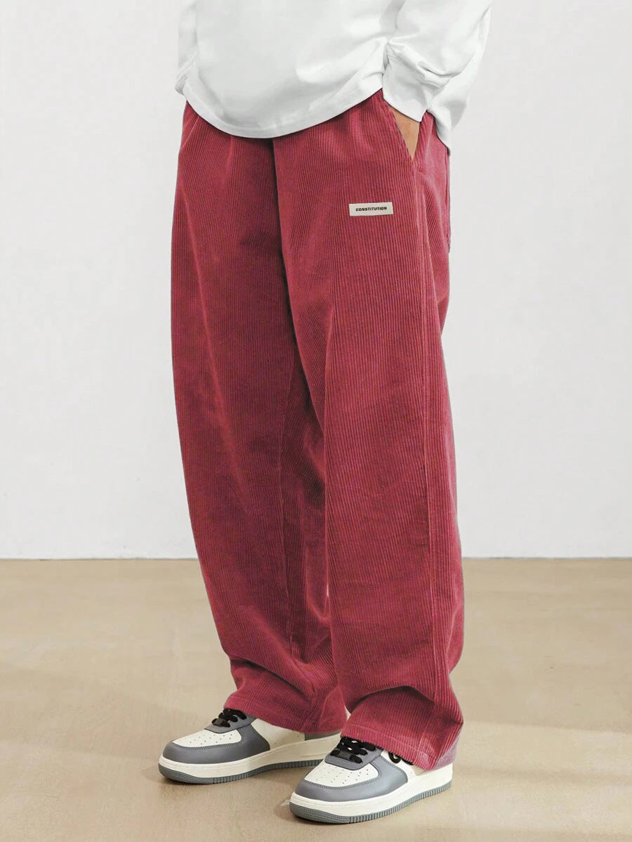 Men's wide-leg ribbed trousers with side pockets and long straight legs