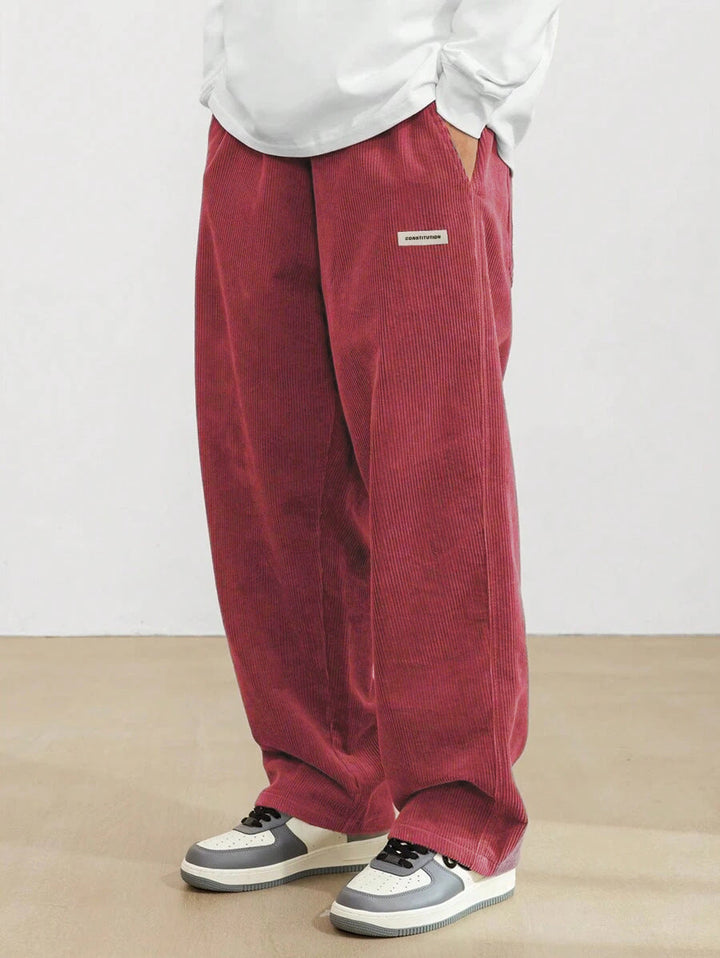 Men's wide-leg ribbed trousers with side pockets and long straight legs