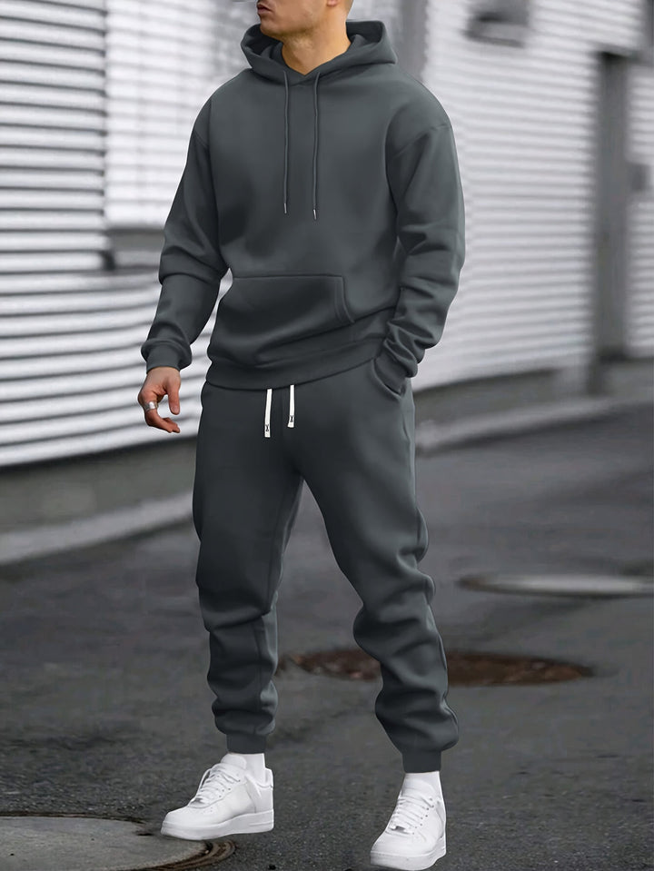 Men's hooded sweatshirt and jogger trouser set with drawstring details and cuffed ankles