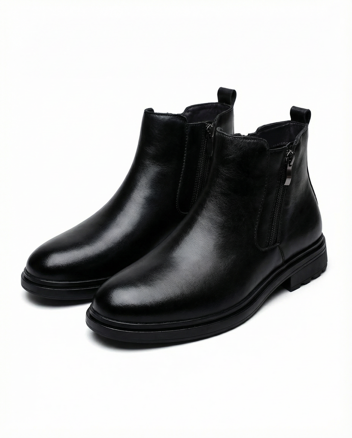 Ankle boots with side zippers, rounded toes, low heels and rear pull tabs