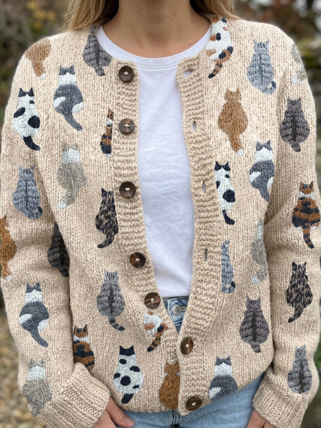 Women's button-front cardigan with repeating cat print and long sleeves