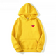 Women's pullover hoodie with hood, long sleeves, kangaroo pocket and small heart graphic