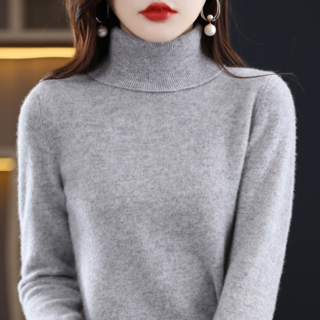 Women's solid knit turtleneck sweater with long sleeves