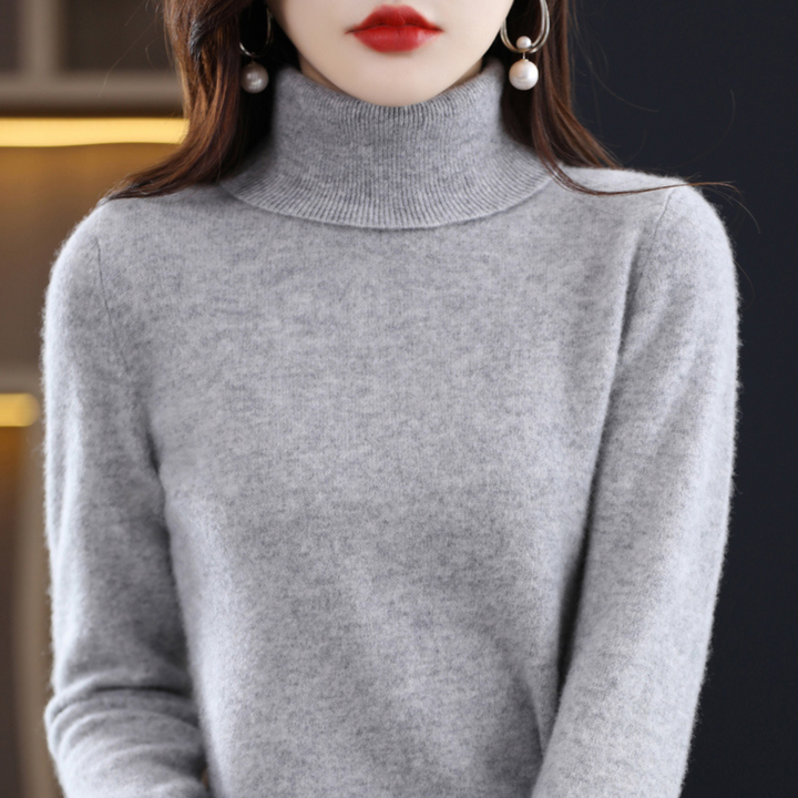 Women's solid knit turtleneck sweater with long sleeves