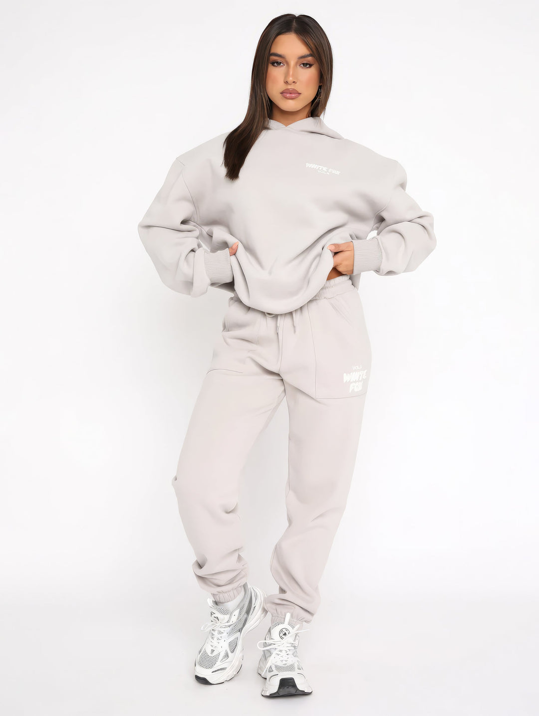 Women's hoodie and jogger tracksuit set with hood and pockets