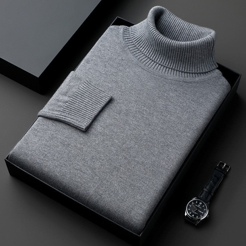 Plain ribbed turtleneck sweater folded in a presentation box