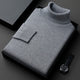 Plain ribbed turtleneck sweater folded in a presentation box