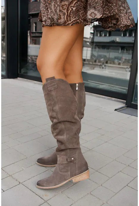 Women's high slouchy tube boots with flat heels and strap details