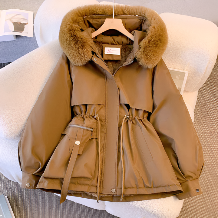 Women's hooded winter coat with fluffy trimmed hood and drawstring waist