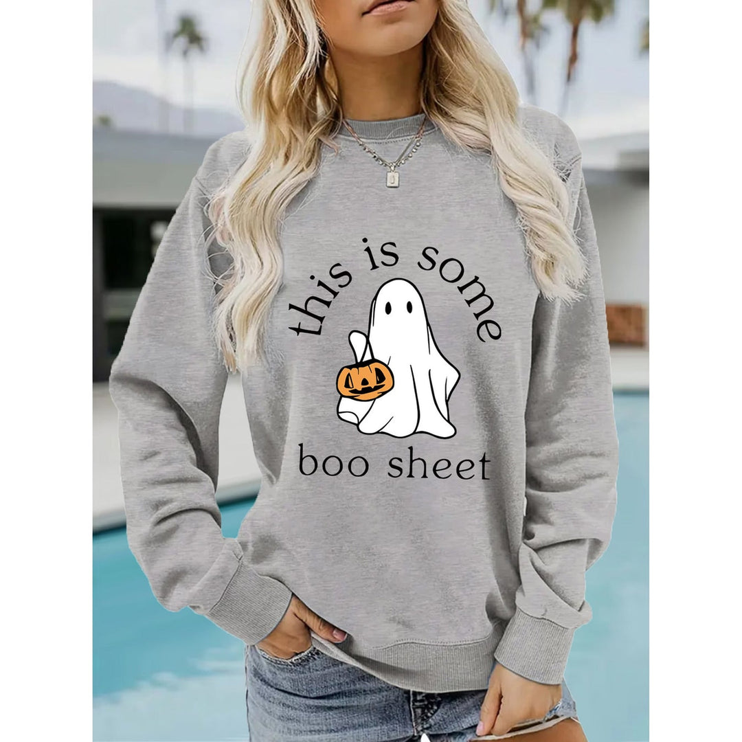 Women's long-sleeve Halloween sweatshirt with ghost and pumpkin graphic