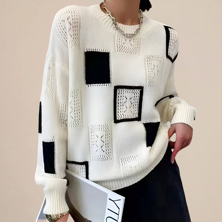 Women's patchwork crew-neck sweater with contrasting geometric panels