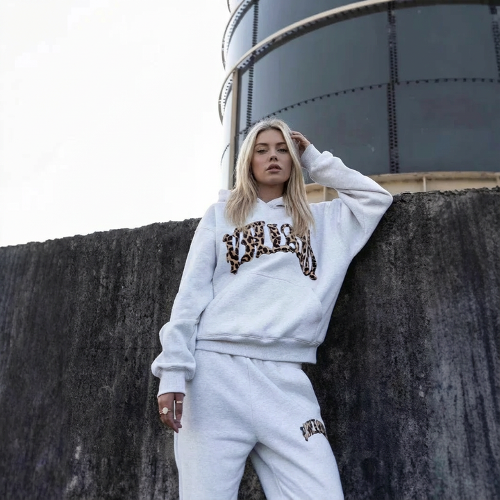 Women's two-piece hoodie and jogger lounge set with leopard-print details