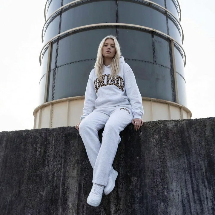 Women's two-piece hoodie and jogger lounge set with leopard-print details