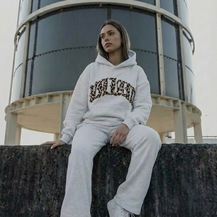 Women's two-piece hoodie and jogger lounge set with leopard-print details