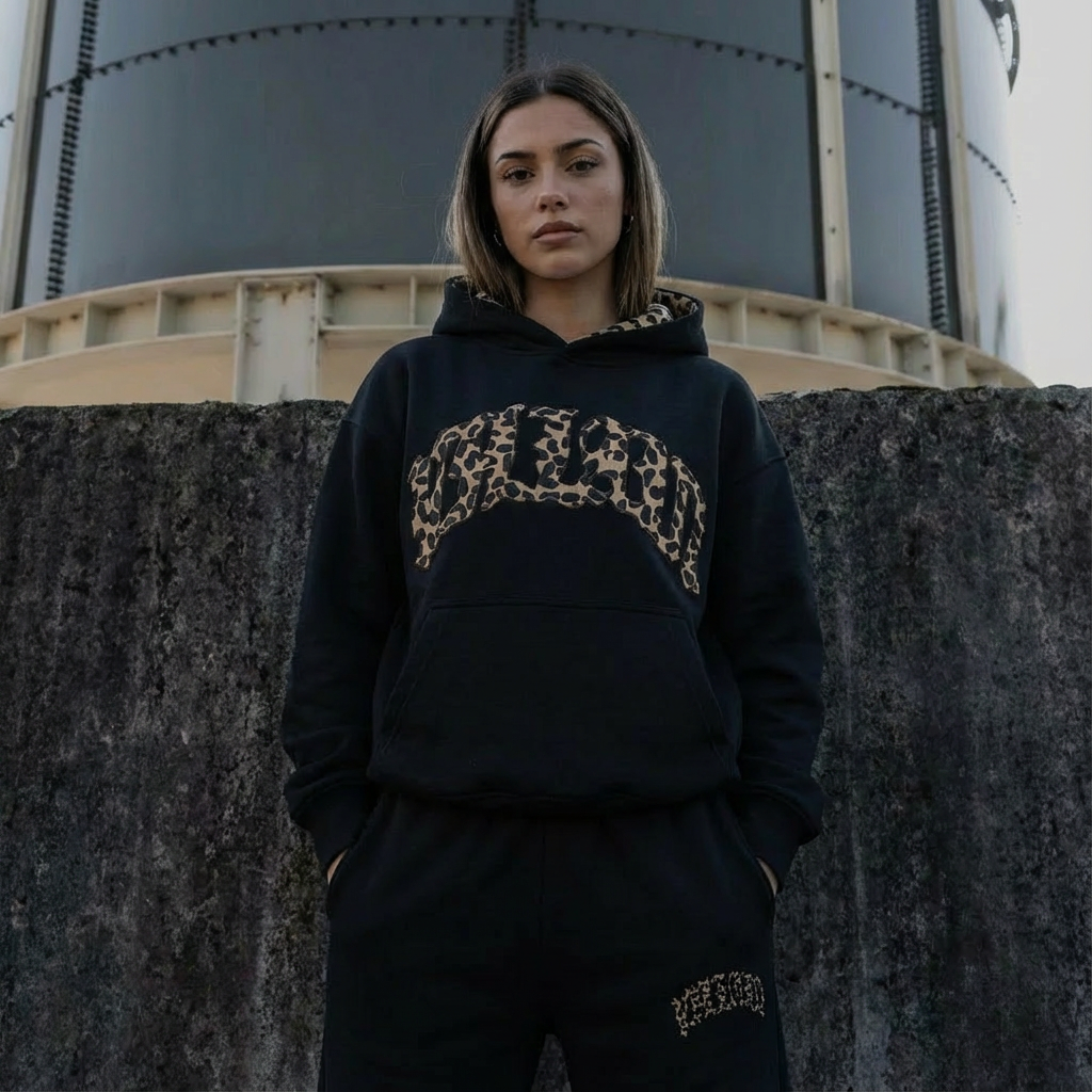 Women's two-piece hoodie and jogger lounge set with leopard-print details