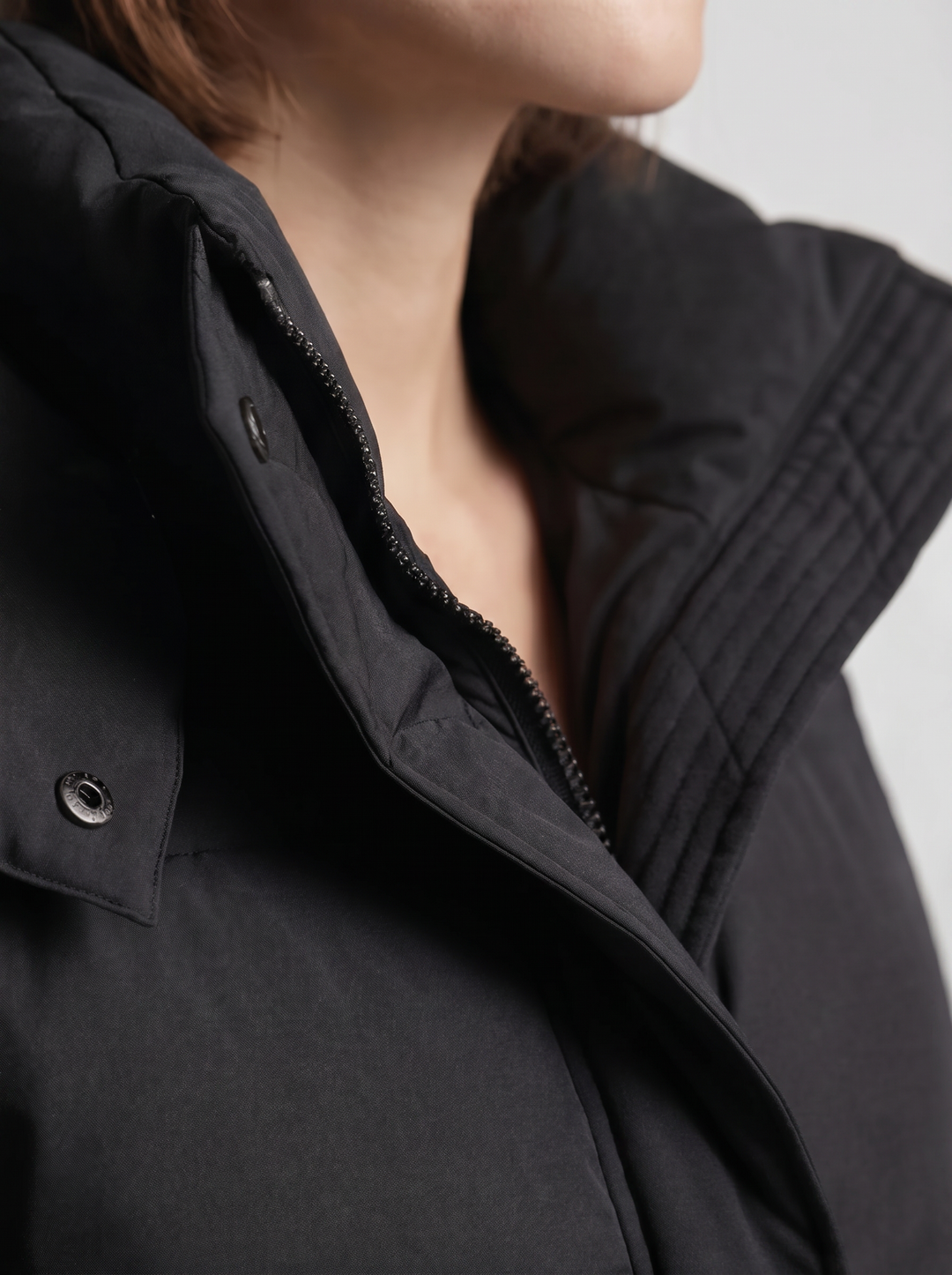 Women's oversized hooded puffer jacket with zip front