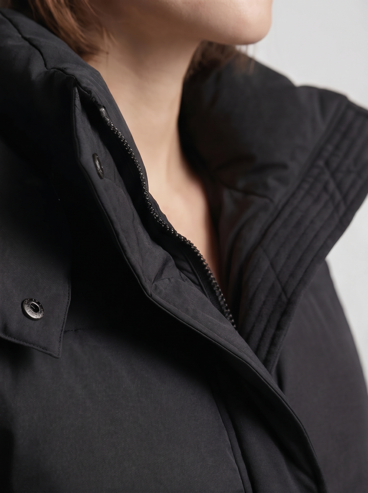 Women's oversized hooded puffer jacket with zip front