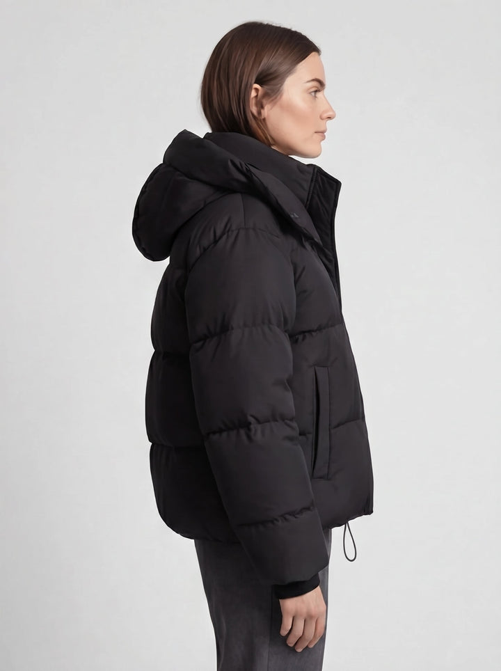 Women's oversized hooded puffer jacket with zip front