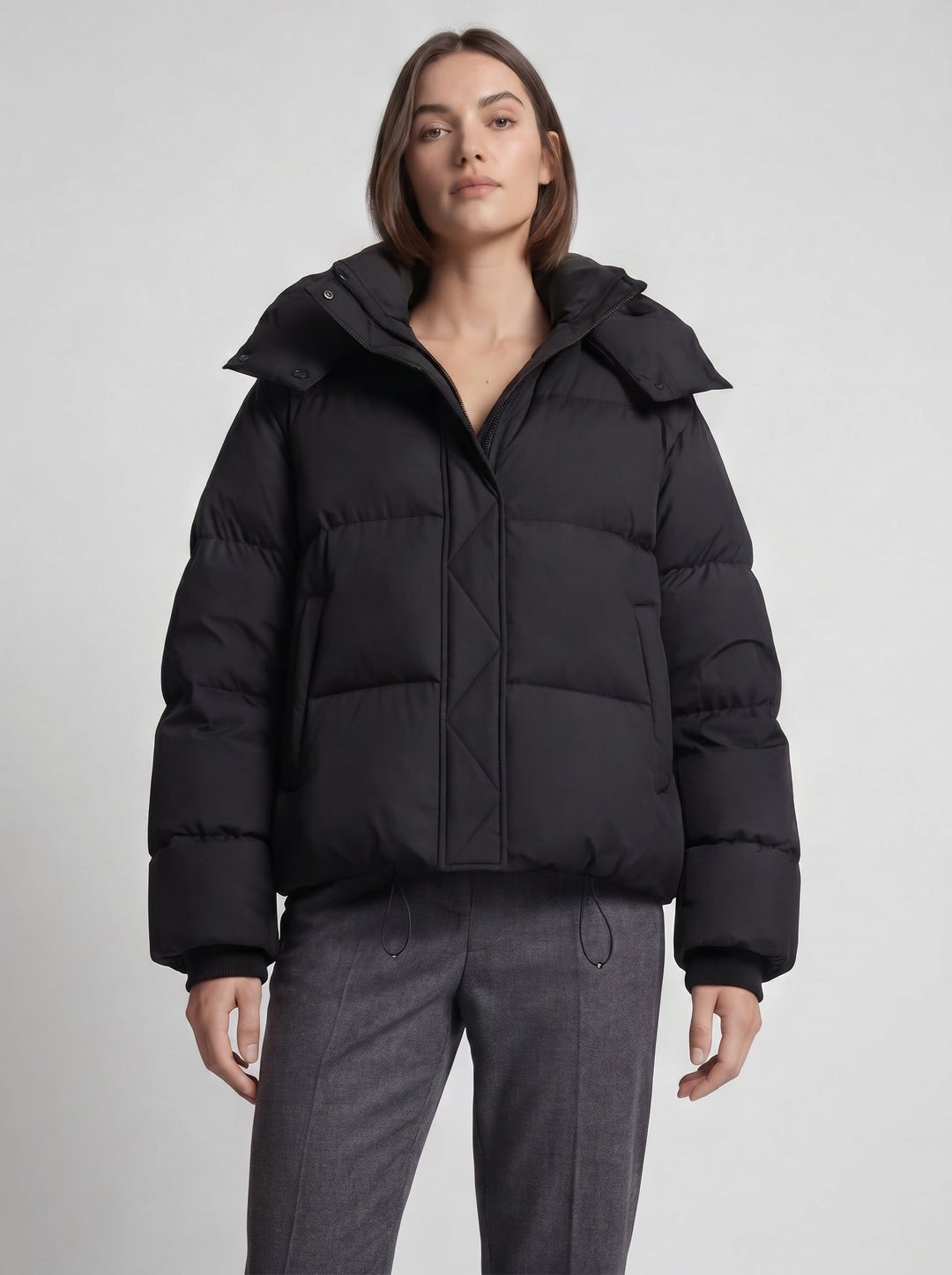 Women's oversized hooded puffer jacket with zip front