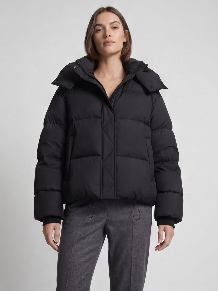 Women's oversized hooded puffer jacket with zip front