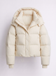 Women's oversized hooded puffer jacket with zip front