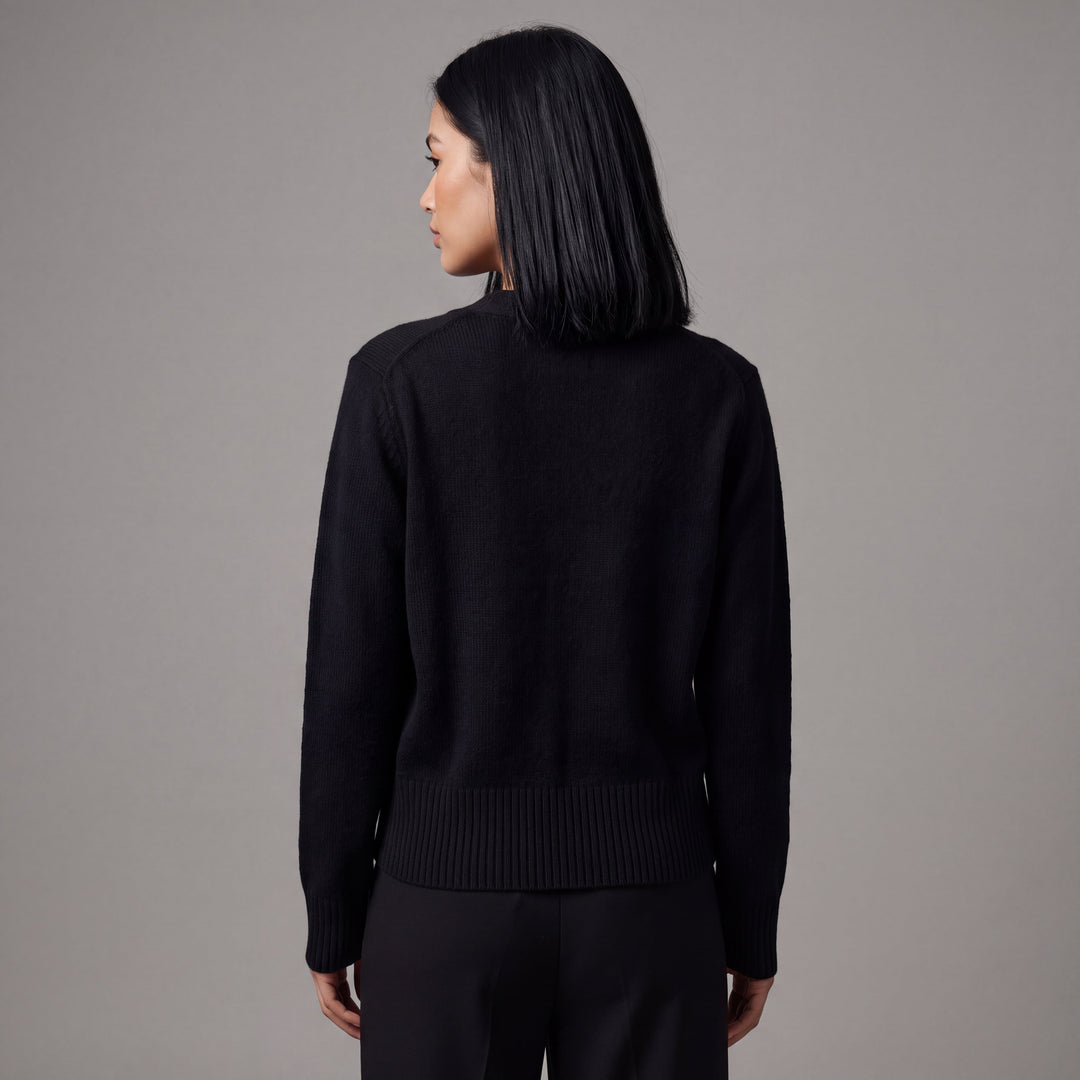 Women's V-neck button front cardigan with long sleeves and ribbed trim