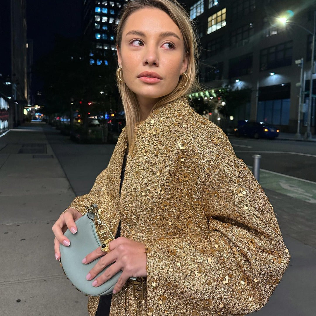 Women's textured metallic jacket with stand collar, long sleeves and front pockets