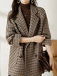 Women's houndstooth blazer coat with notched lapels and button front