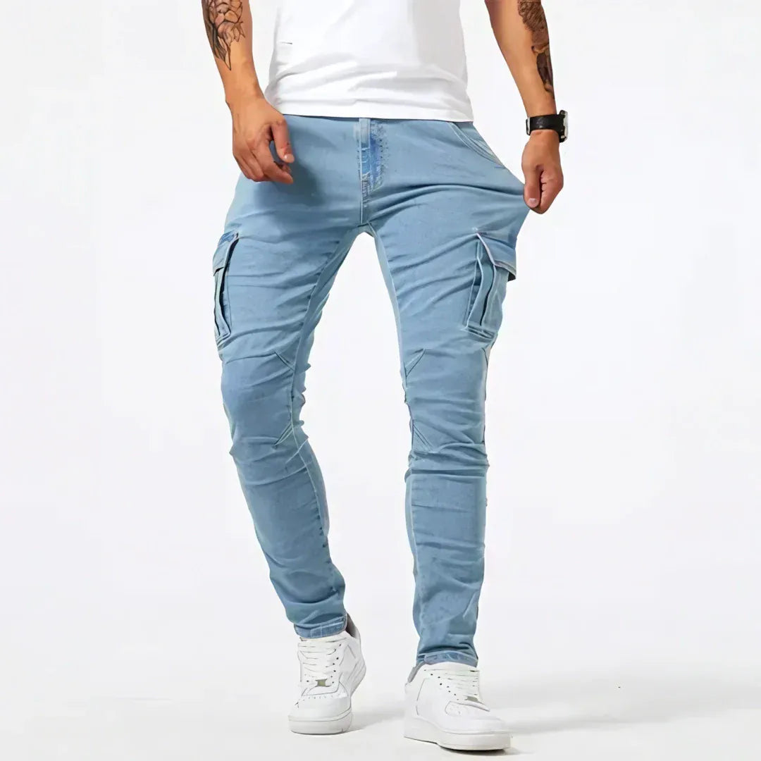 Men's tapered cargo jeans with multiple thigh pockets and panel detailing