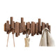 Wall-mounted wooden coat rack with staggered piano-style slats and angled hooks