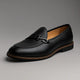 Men's slip-on loafers with metal vamp trim and low heels