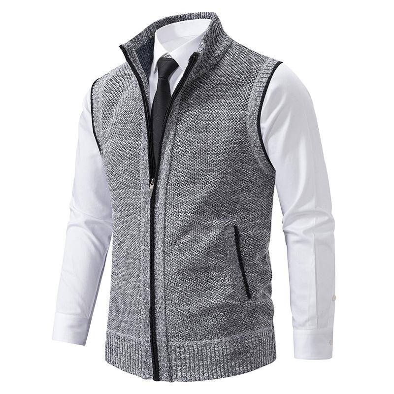 Sleeveless fleece vest with high neck zip front and pockets