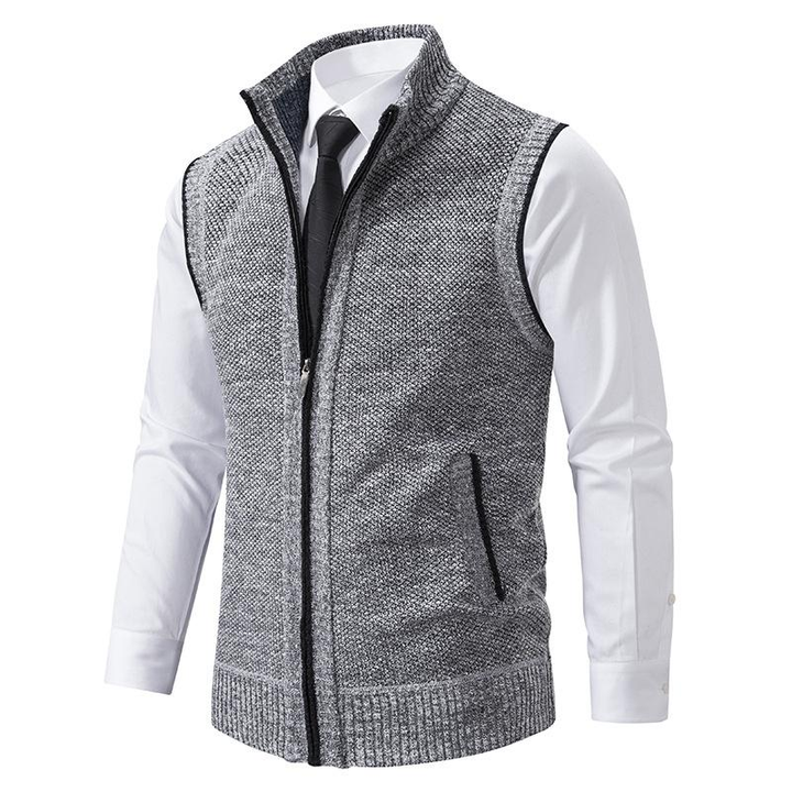 Sleeveless fleece vest with high neck zip front and pockets